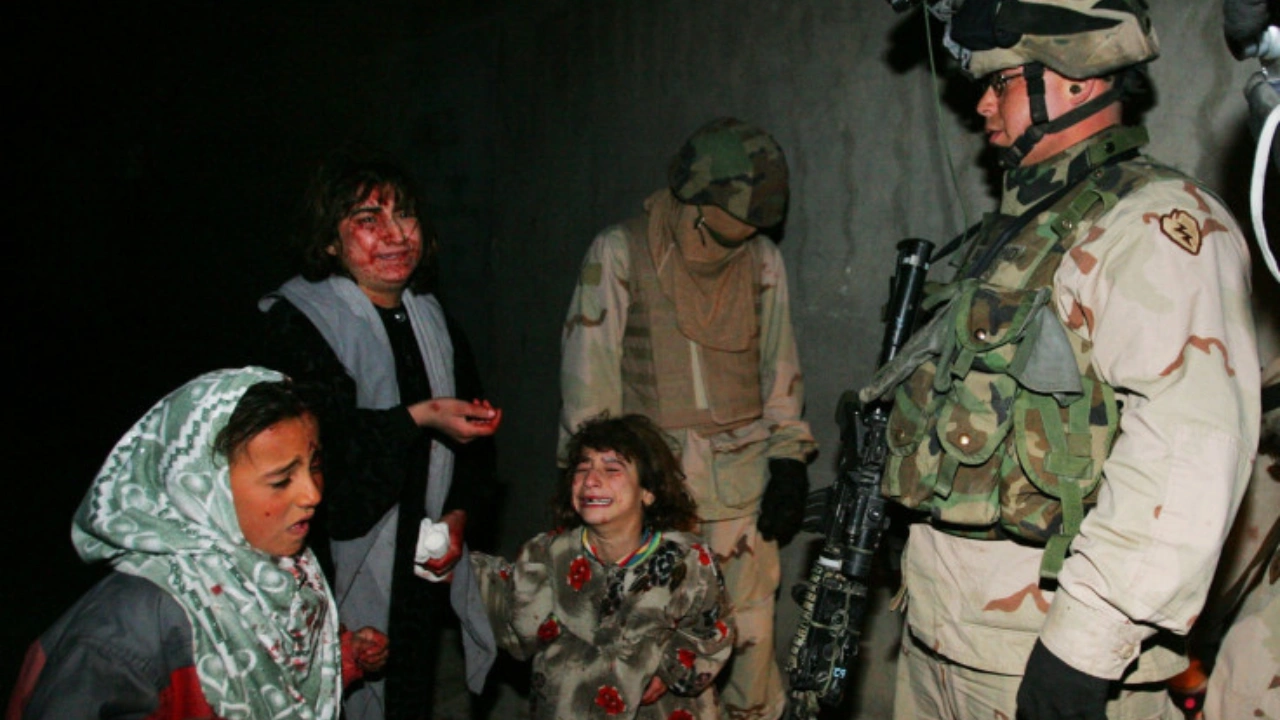 Iraqi Girl at Checkpoint (2005) — Chris Hondros